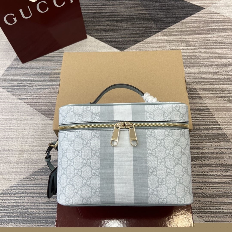 G*u*i cosmetic bags